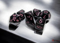 Chessex Dice - Opaque Black/Pink Polyhedral 7-Die Set